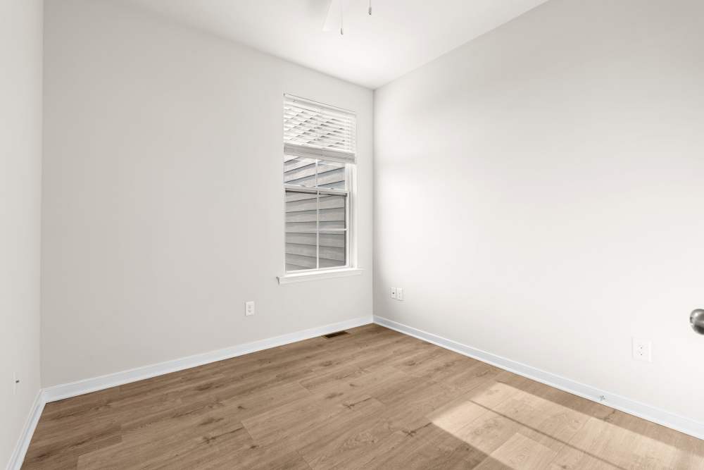 Unfurnished room with plank flooring at The Westbrook at Brewer's Row in Richmond, Virginia