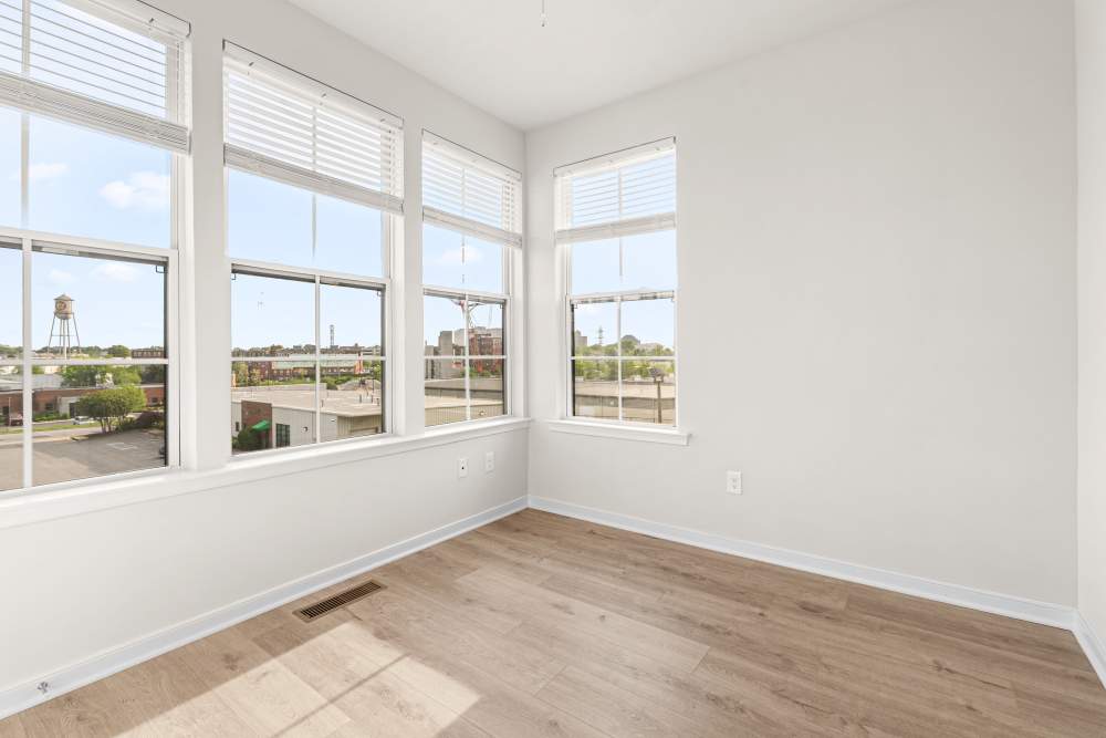Spacious room with corner windows at The Westbrook at Brewer's Row in Richmond, Virginia