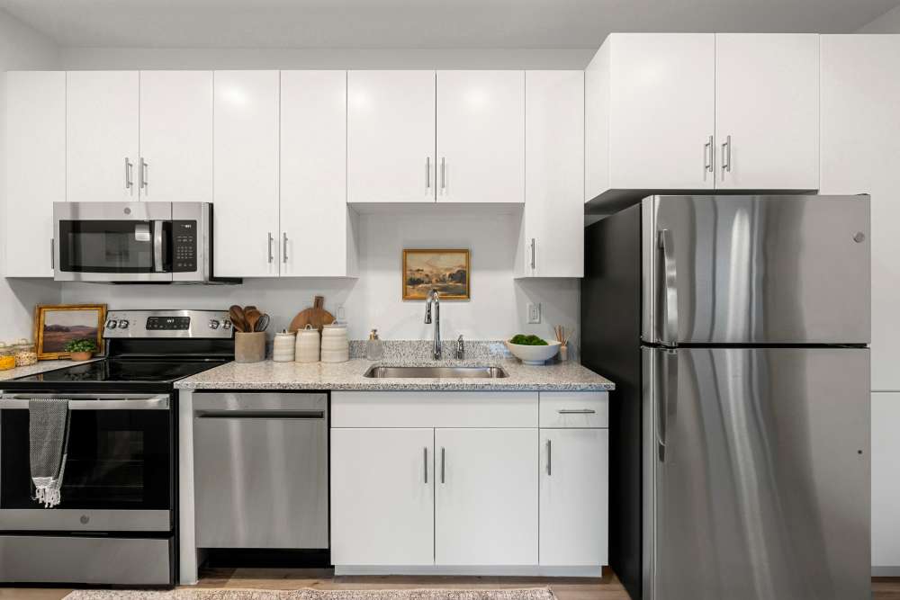 Kitchen with dishwasher at Olympus at Arroyo Verde in Tucson, Arizona