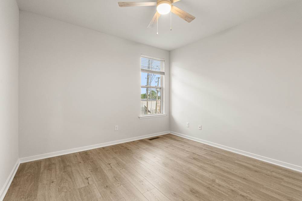 Unfurnished guest bedroom in a townhome at The Westbrook at Brewer's Row in Richmond, Virginia