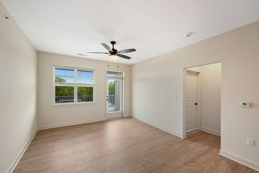 Spacious living room with hard wood floors at Canopy on Western in Waldorf, Maryland