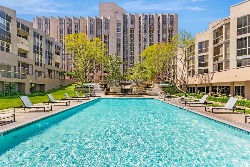 Poolside sun chairs at Promenade Towers in Los Angeles, California