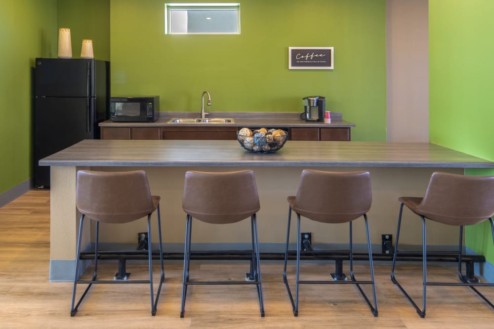 Clubhouse kitchen seating at Casa de Encantada Senior Apartments in Rio Rancho, New Mexico