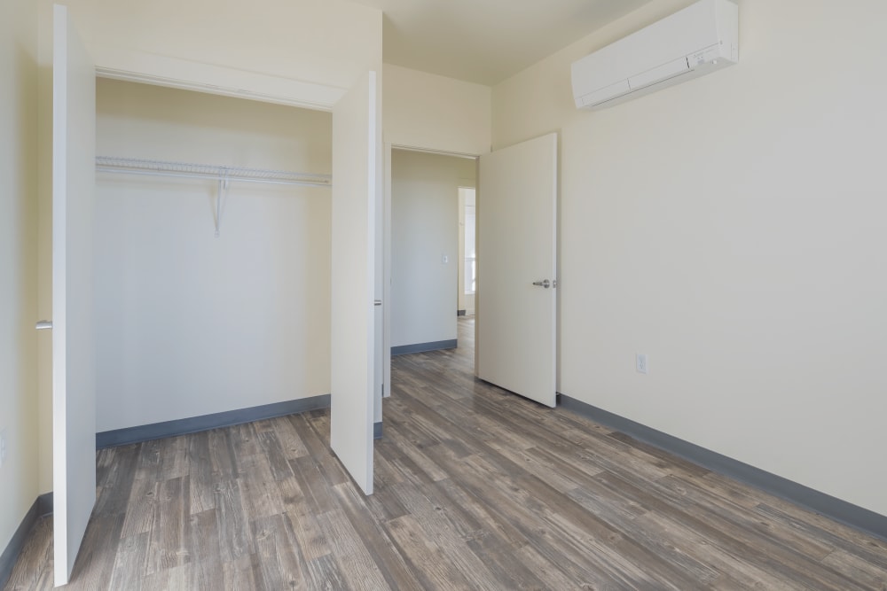 Bedroom with closet at Casa de Encantada Senior Apartments in Rio Rancho, New Mexico