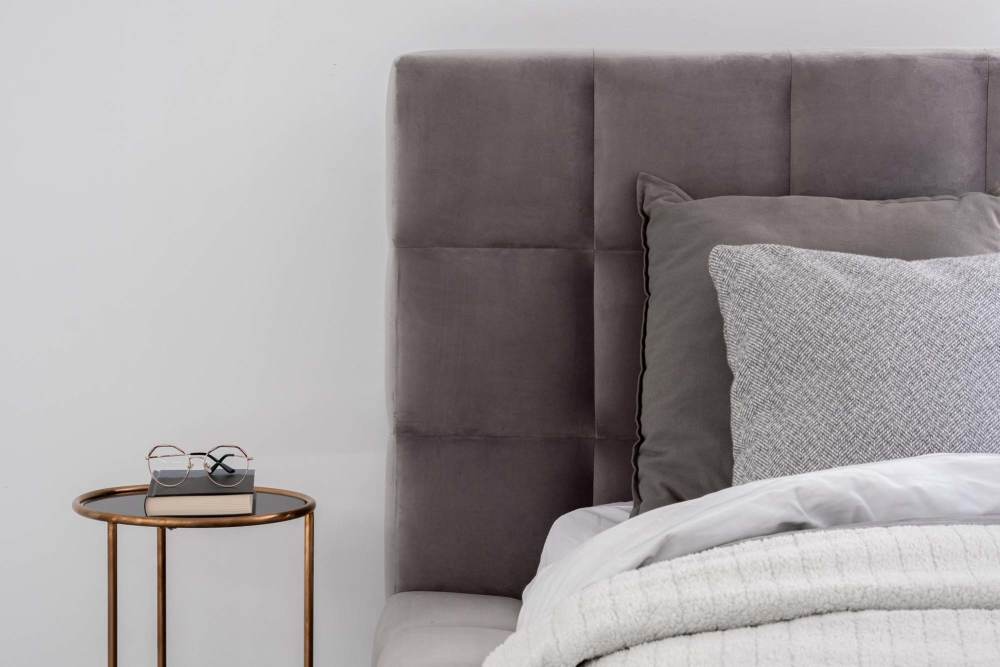 Bedroom with side table at Sage5430 in Norcross, Georgia