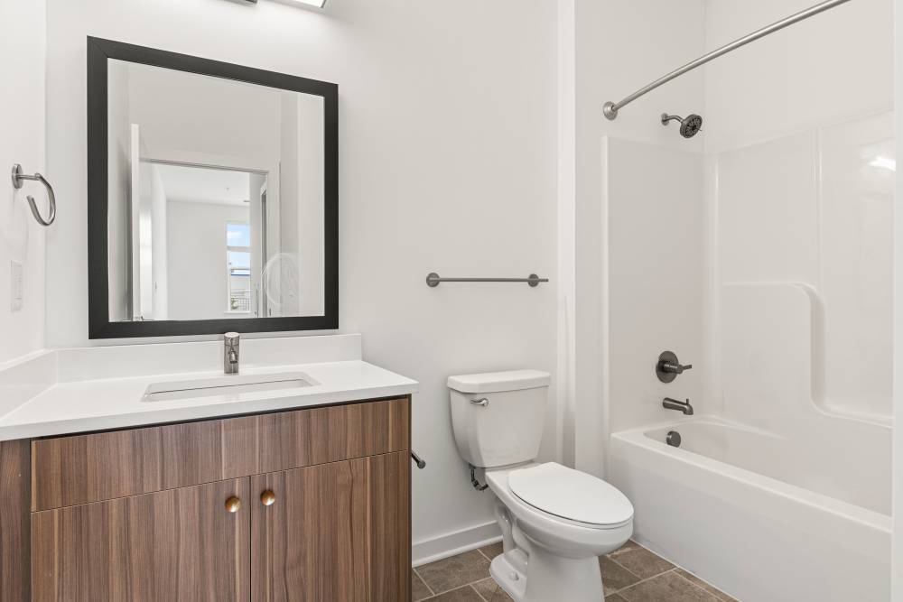 Bathroom with bathtub at The Alder on Dabney in Richmond, Virginia
