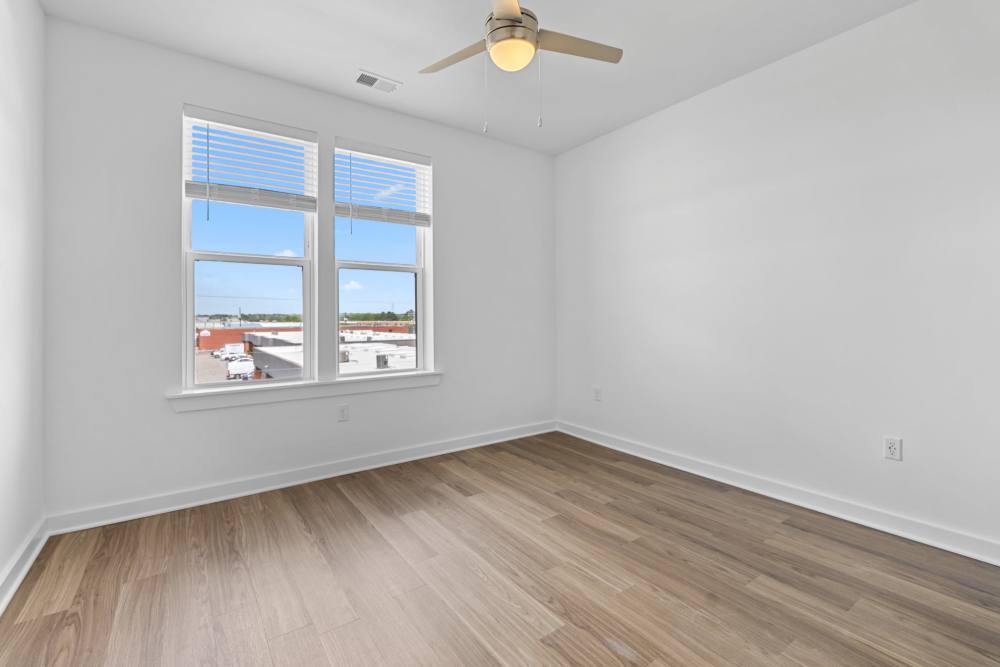 Spacious bedroom with ceiling fan at The Alder on Dabney in Richmond, Virginia