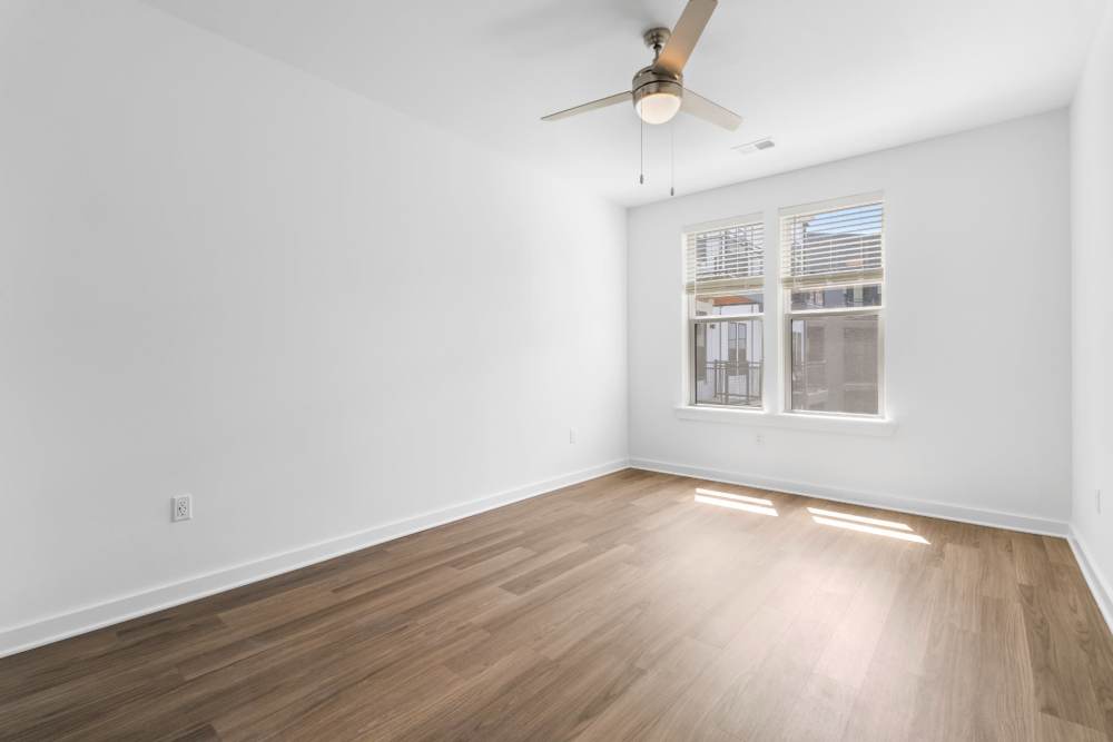 Spacious room with ceiling fan at The Alder on Dabney in Richmond, Virginia