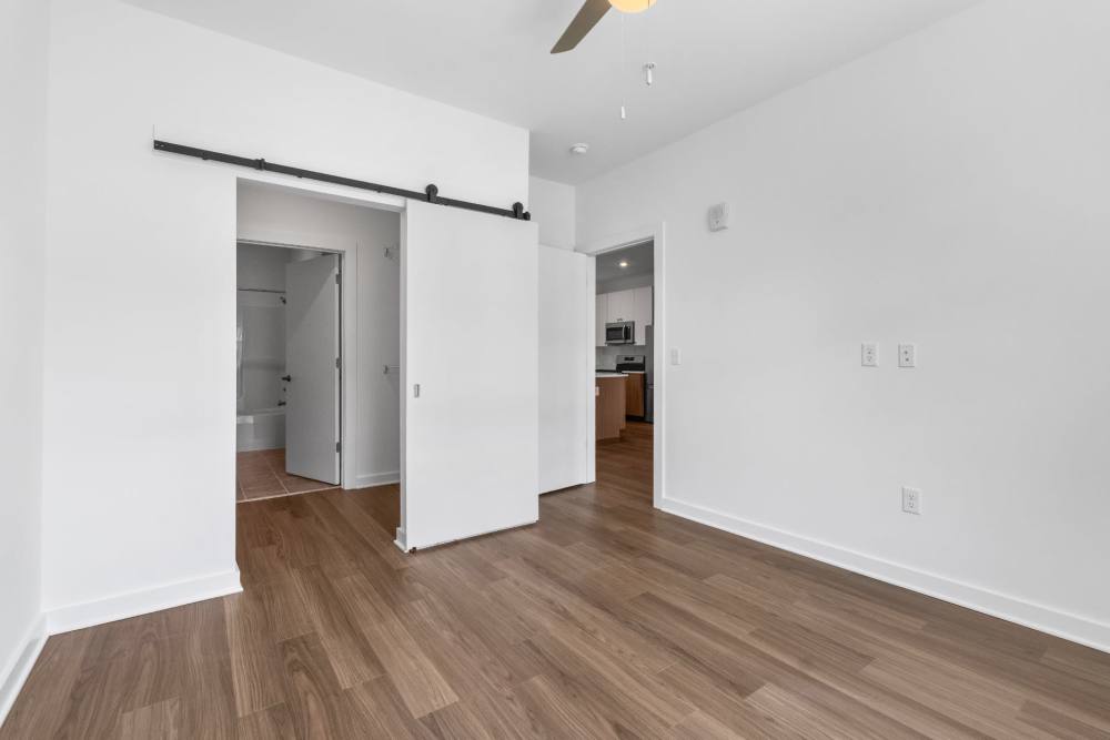 Bedroom with bathroom and closet at The Alder on Dabney in Richmond, Virginia