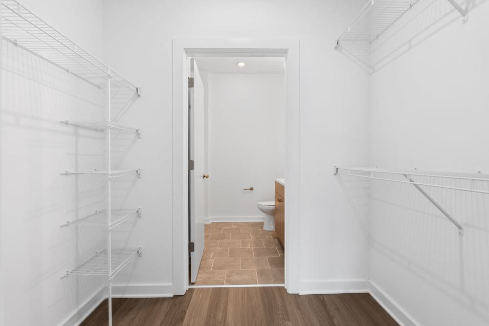 Walk-in closet with bathroom access at The Alder on Dabney in Richmond, Virginia