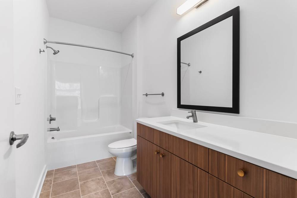 White bathroom at The Alder on Dabney in Richmond, Virginia
