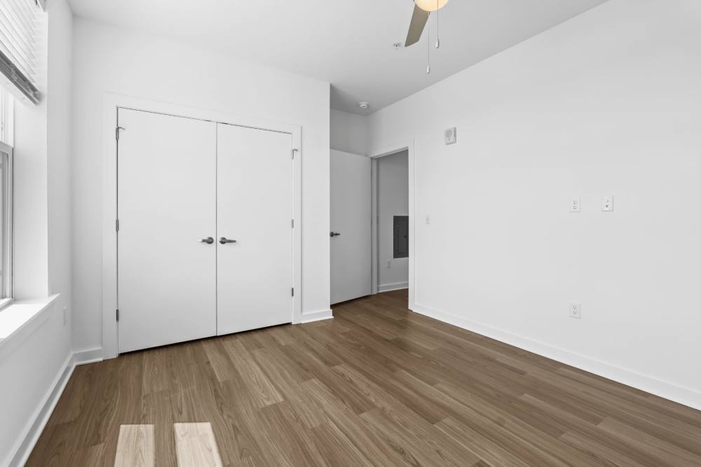 Bedroom with built-in closet at The Alder on Dabney in Richmond, Virginia