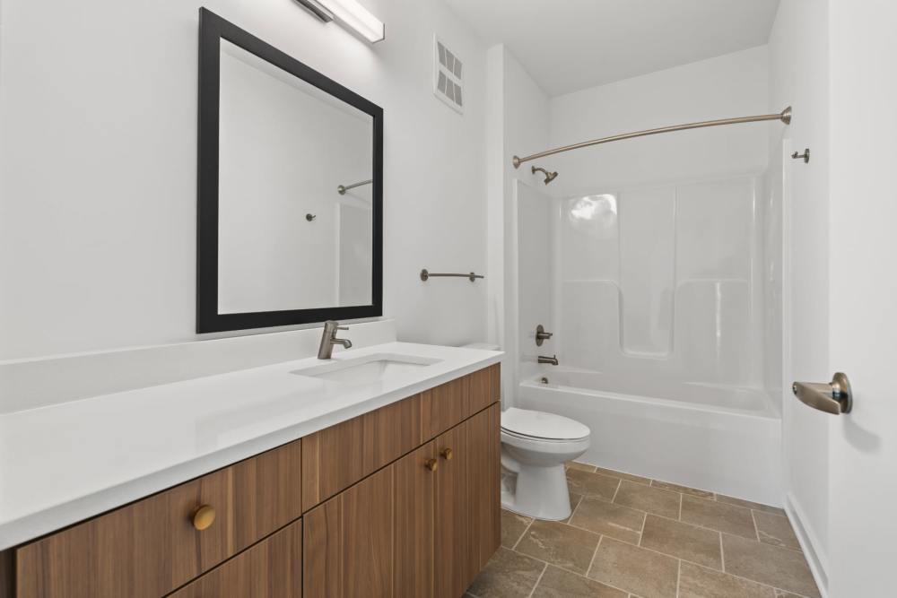Bathroom with large vanity at The Alder on Dabney in Richmond, Virginia