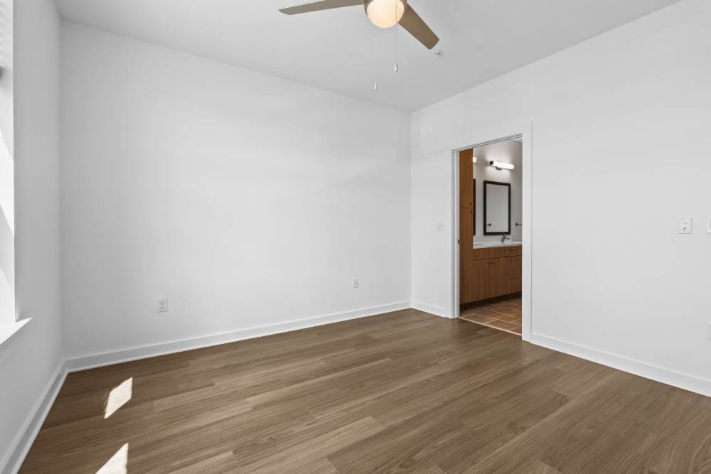 Unfurnished bedroom with ensuite bathroom at The Alder on Dabney in Richmond, Virginia