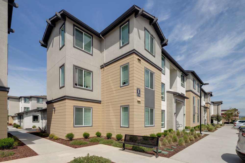 Outdoor view of the apartments at Village at First in Gilroy, California