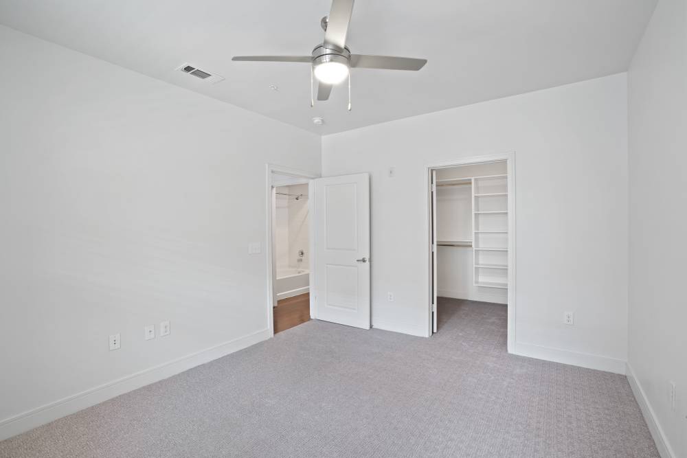 Bedroom with closet space at Trinity Bluff & Trinity District in Fort Worth, Texas