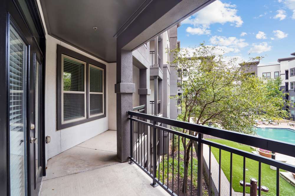 Balcony facing the pool at Trinity Bluff & Trinity District in Fort Worth, Texas