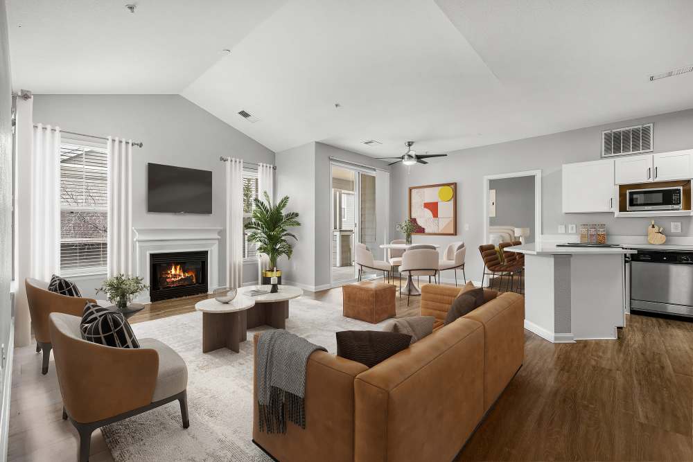 Elegantly furnished, upgraded living with with hardwood-like flooring at Briargate on Main in Parker, Colorado
