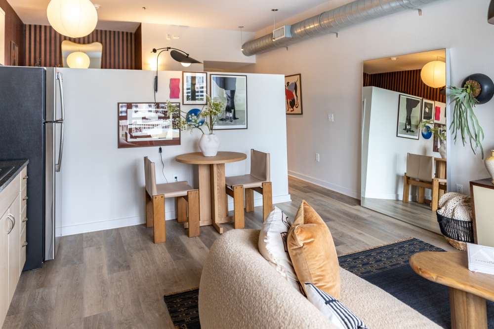 Comfortable and cozy bedroom in a model home at Nova Apartment Homes in San Diego, California