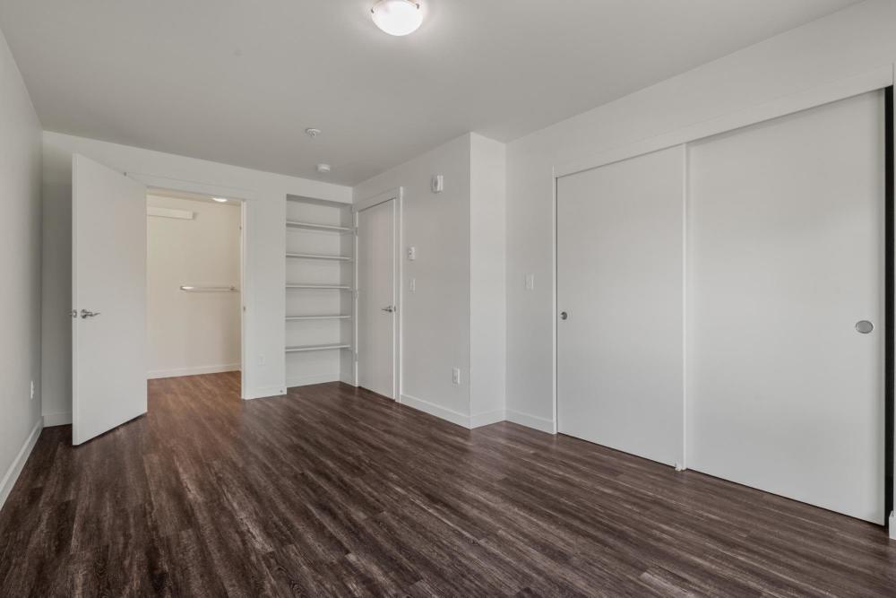 Bedroom with storage area at Blanton Commons in Beaverton, Oregon
