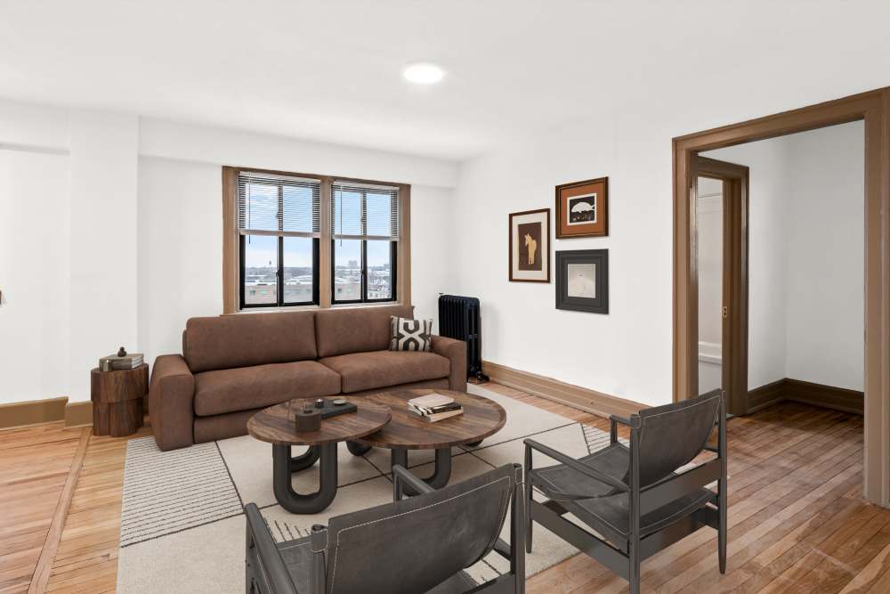 Living room with wood-style flooring at Detroit Living in Detroit,Michigan
