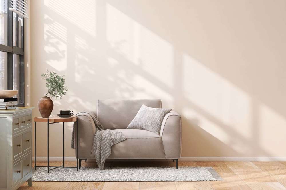 Living room with chair at Detroit Living in Detroit, Michigan