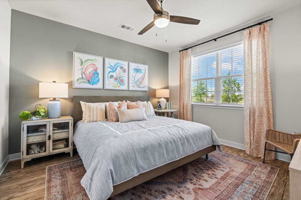 Bedroom with large windows at Mexico Beach Crossings in Mexico Beach, Florida