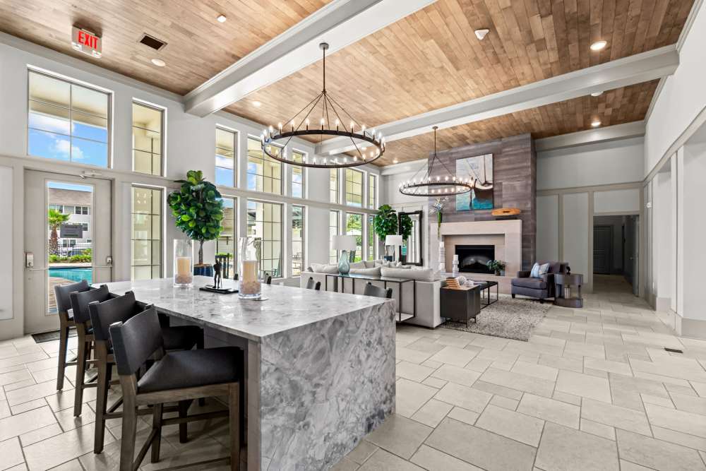 Community clubhouse with fireplace at Watersound Origins Crossings in Inlet Beach, Florida