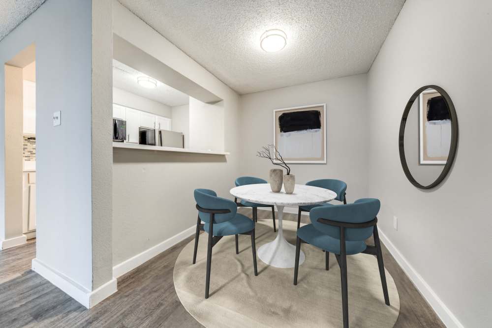 Dining area with four-seater table at Icon Apartments in San Antonio,Texas