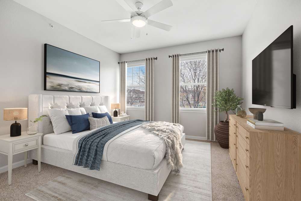 A ton of natural light shining in on this newly renovated bedroom at Briargate on Main in Parker, Colorado