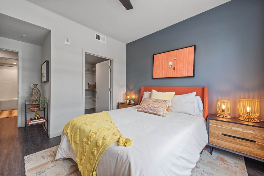 Bedroom with an accent wall at The Fields in Milpitas, California
