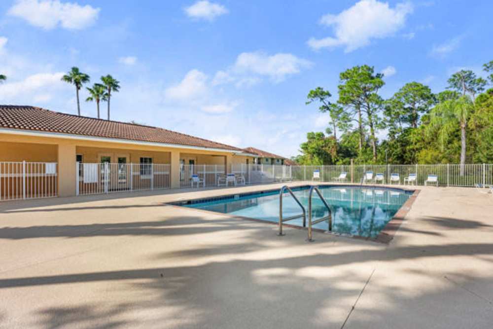 Spacious swimming pool for the community at Pelican Isles Apartments in Sebastian, Florida