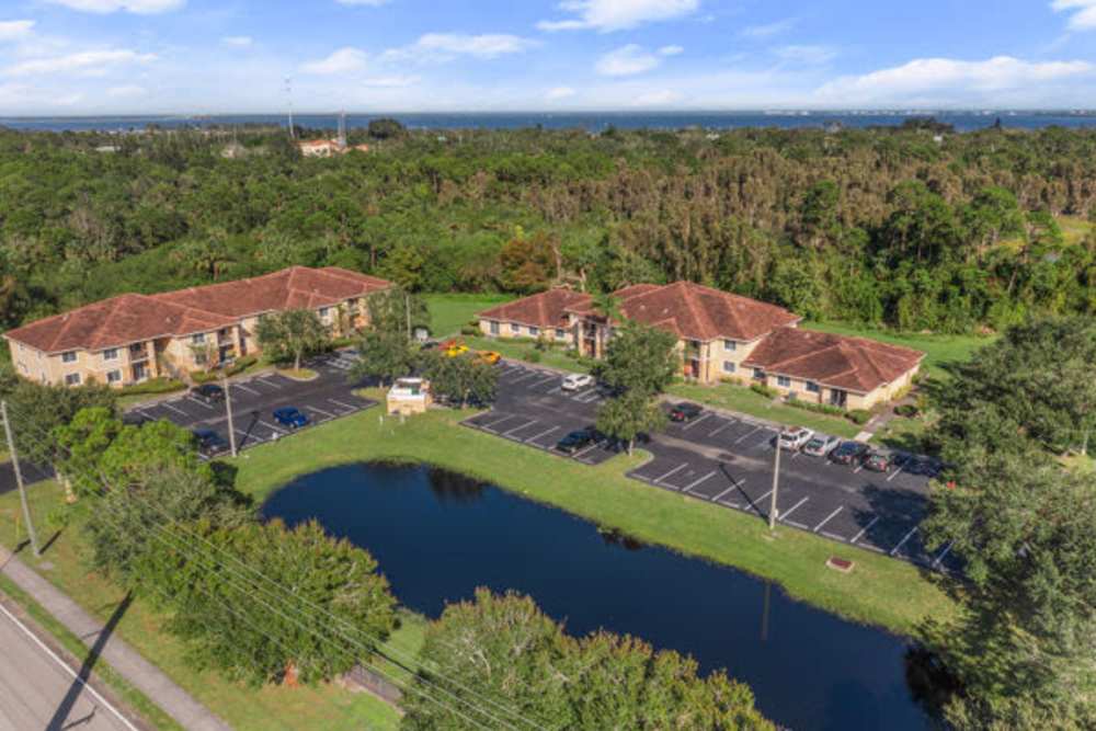 Image showing a large pond around the property at Pelican Isles Apartments in Sebastian,Florida