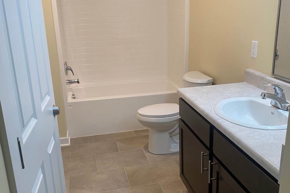 Apartment bathroom at Saratoga Place Apartments in Suffolk, Virginia