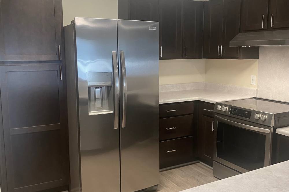 Apartment kitchen at Saratoga Place Apartments in Suffolk, Virginia