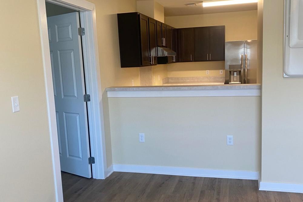 Wood-style flooring in an apartment at Saratoga Place Apartments in Suffolk, Virginia