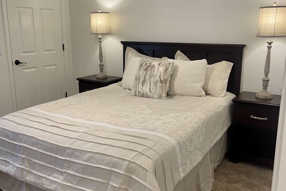 Cozy bedroom with comfortable bed at Park on Gilder Creek in Mauldin, South Carolina