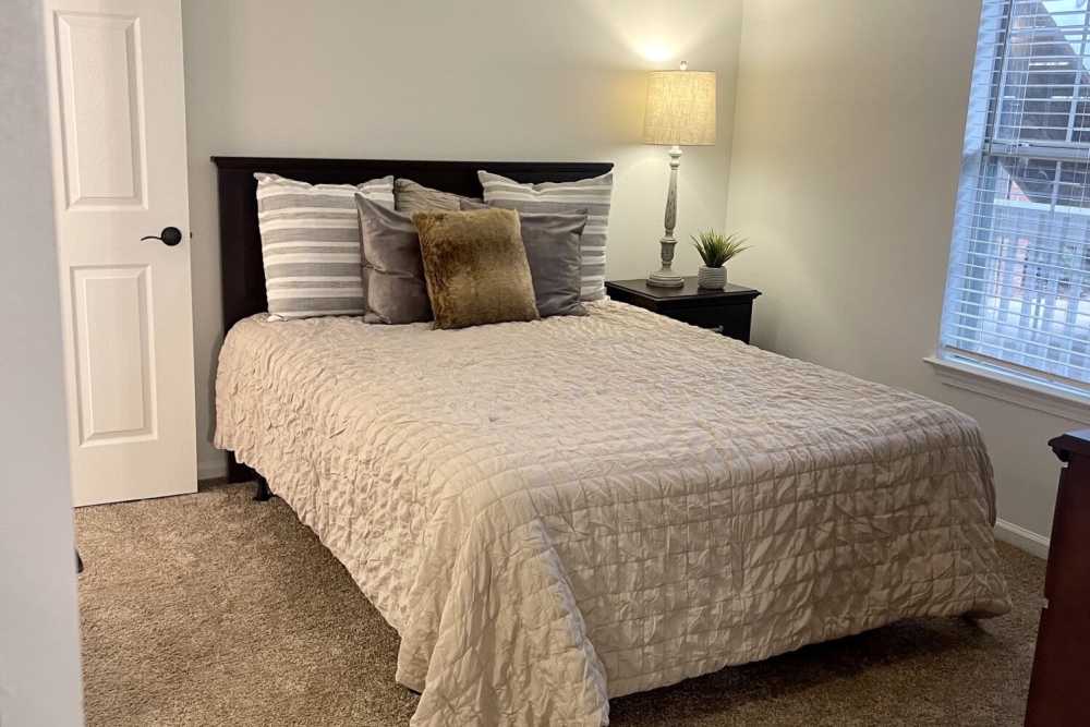Bedroom with comfortable bed at Park on Gilder Creek in Mauldin, South Carolina