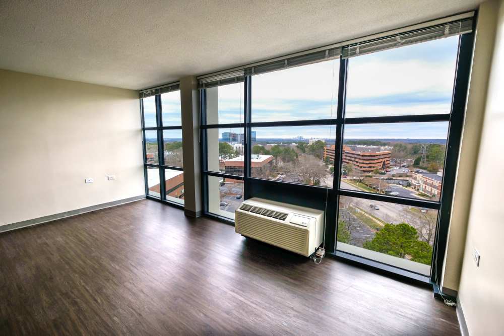 Home with floor-to-ceiling windows at Capital Towers in Raleigh, North Carolina