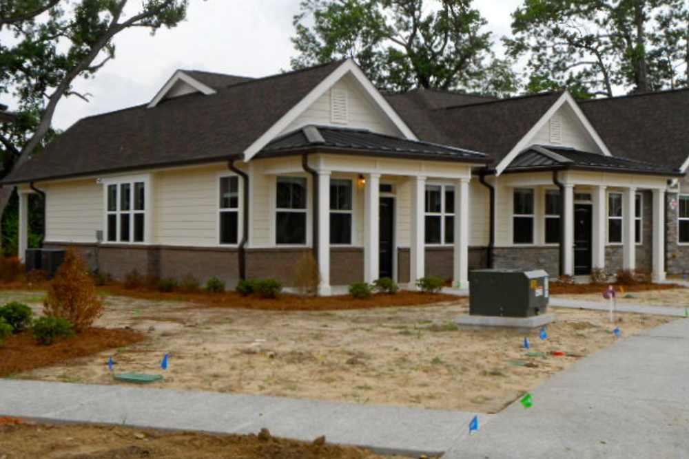 Sidewalk outside the leasing office at Ellsworth Commons Apartments in Greenville, North Carolina