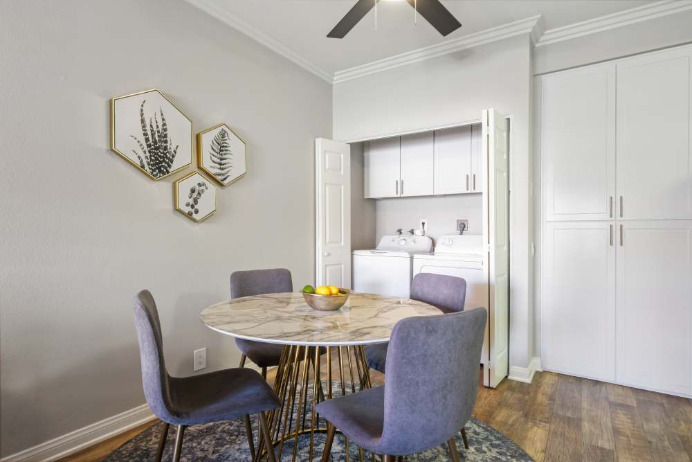 Dining room with a washer and dryer at Paloma Summit Condominium Rentals in Foothill Ranch, California