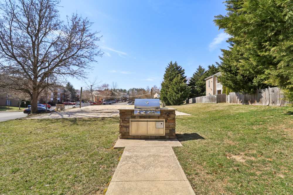 Outdoor grilling station at Malvern Lakes Apartments in Fredericksburg, Virginia
