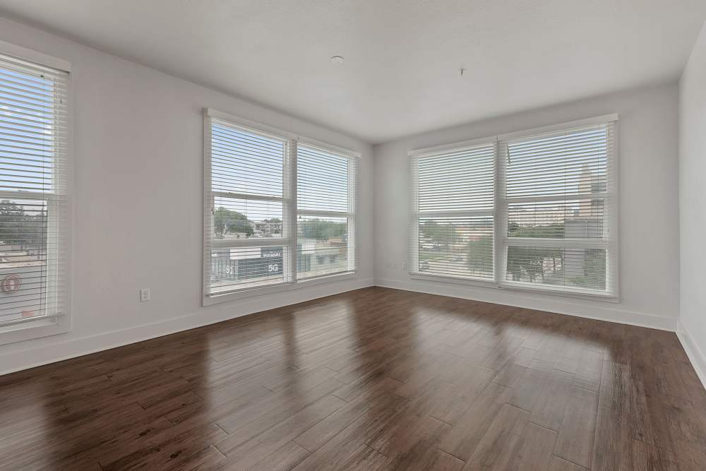 Living room with glass windows at The Lofts At West 7th in Fort Worth, Texas