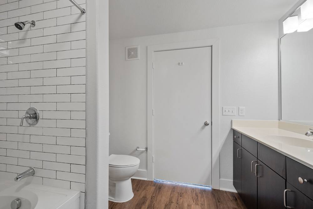 Bathroom with storage at The Lofts At West 7th in Fort Worth, Texas