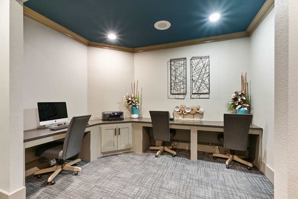 Work area with desktops at Beacon Lakes in Dickinson, Texas
