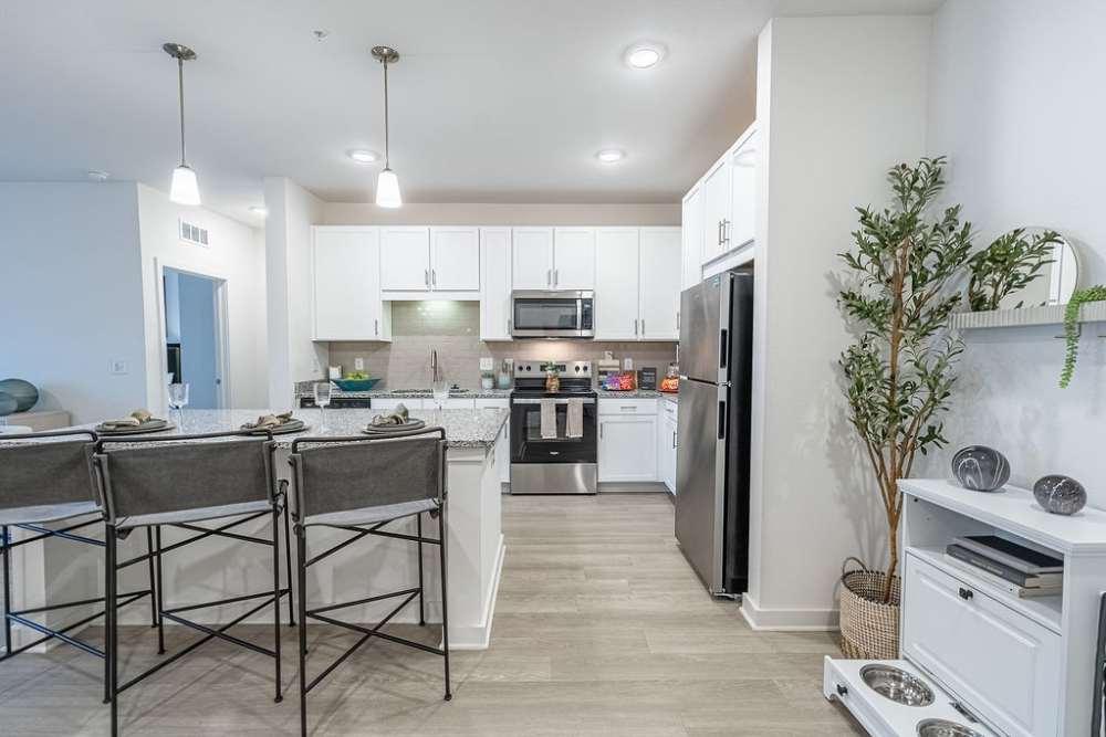 Kitchen and dining area at Avion Apartments in Jacksonville, Florida