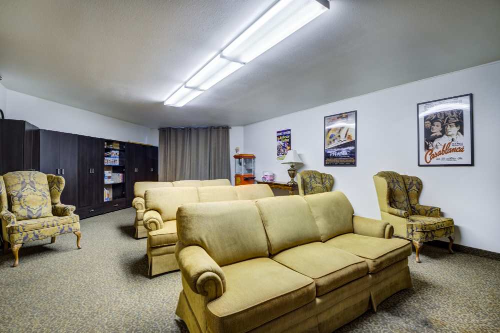 Movie room with couches at Truewood by Merrill, Fig Garden in Fresno, California