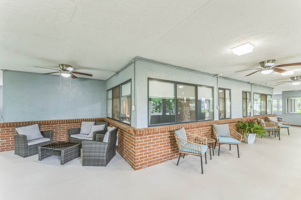 A room with tables and chairs at Regency House by Barclay House in Decatur, Georgia