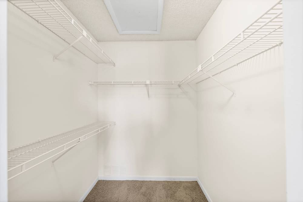 Walk-in closet at Clipper Cove Apartments in Boynton Beach, Florida