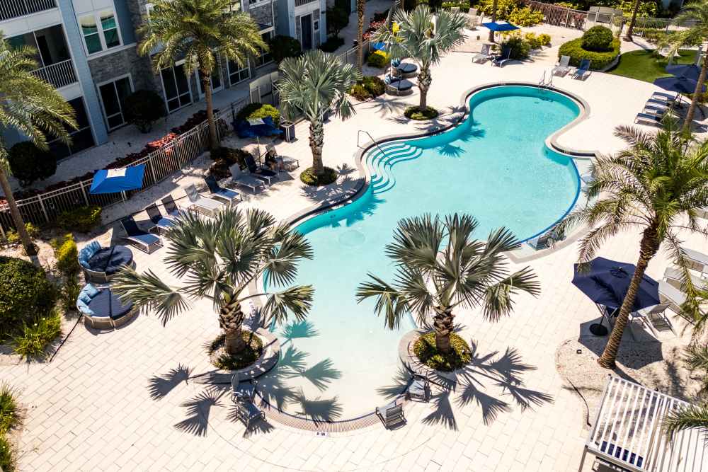 A crystal-clear swimming pool at The Addison Skyway Marina in St. Petersburg, Florida